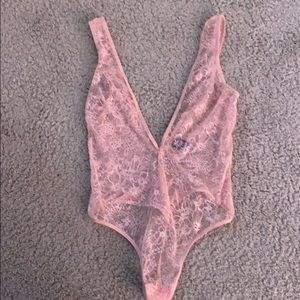 Victoria’s Secret pink lace body suit
